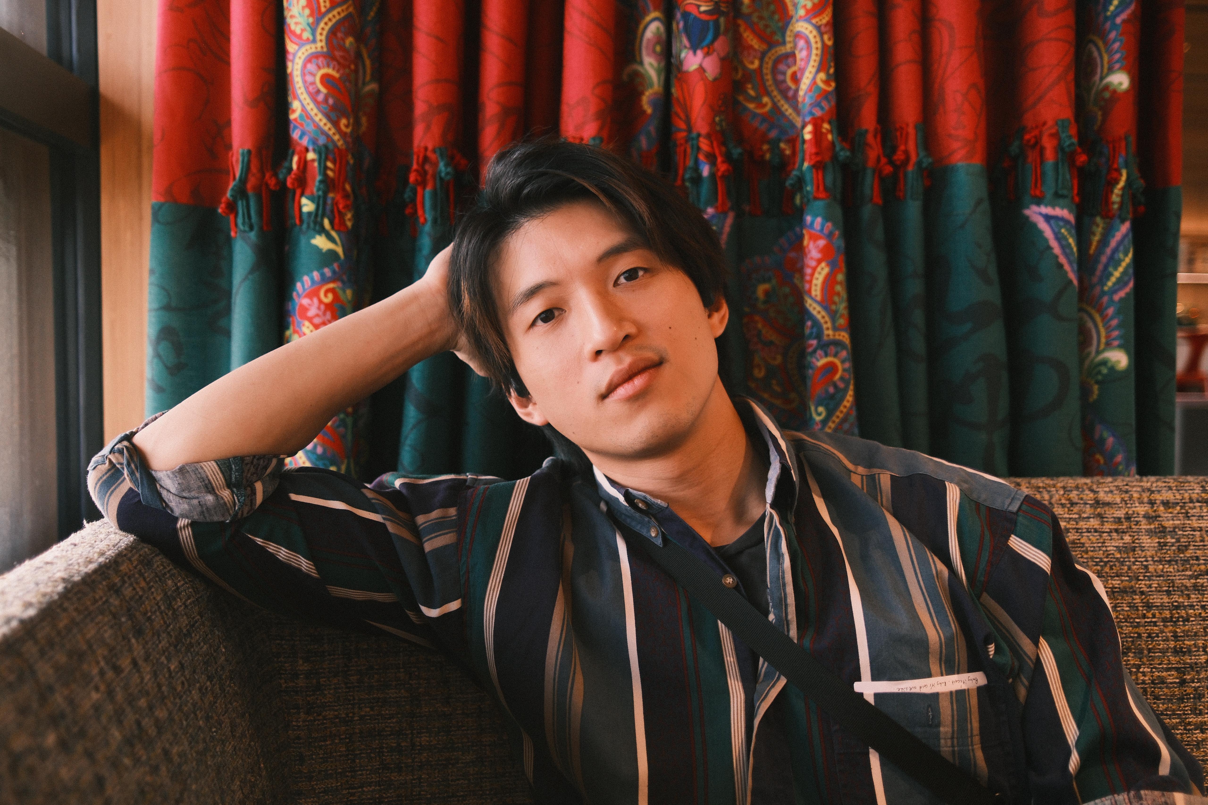 Terrence Leung seated for an editorial portrait